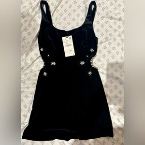 Black dress with silver jewelry design